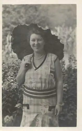 Souvenir vintage photo postcard anonymous woman with umbrella