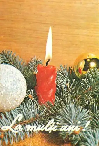 Winter Holidays greetings globes, lit candle decorative ornaments