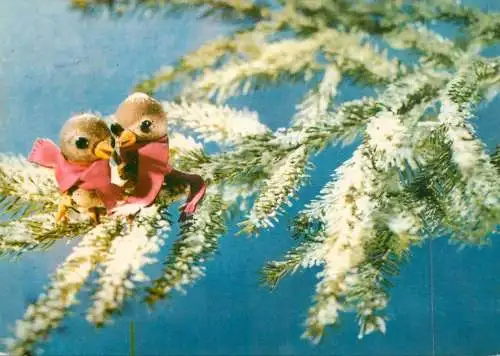 Merry Christmas greetings bird ornaments on fir tree branch