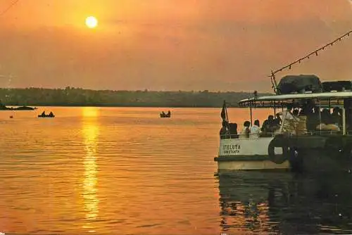 Romania Mamaia cu vaporasul pe Siut-Ghiol apus de soare