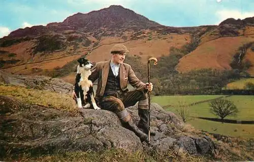 Animal postcard dog and owner in Scotland highlands