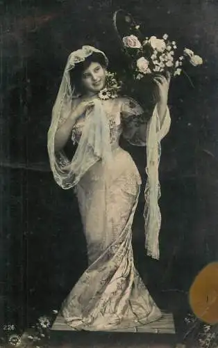 Fancy portrait woman bride dress and flower bouquet
