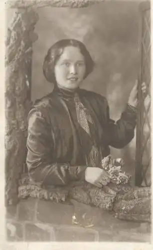 Annonymous person portrait vintage souvenir photo postcard elegant woman coiffure