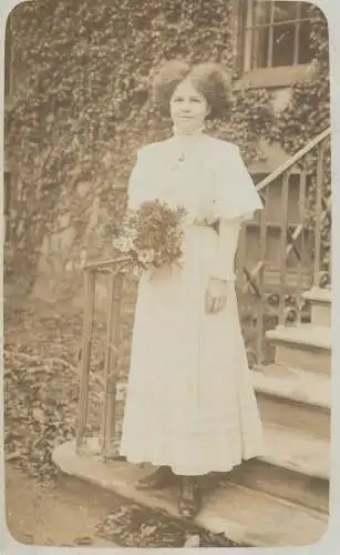 Annonymous person portrait vintage souvenir photo postcard elegant woman coiffure