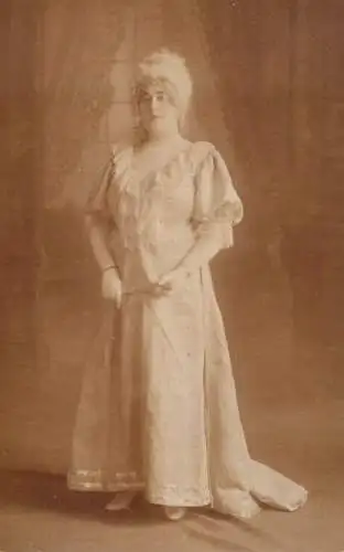 Annonymous person portrait vintage souvenir photo postcard elegant woman wig