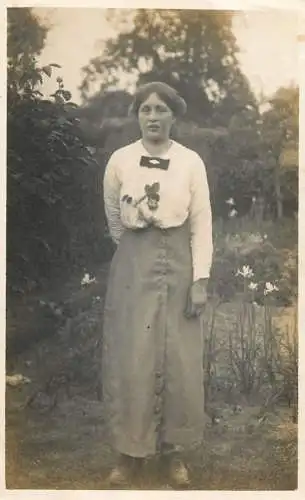 Annonymous person portrait vintage souvenir photo postcard elegant woman coiffure