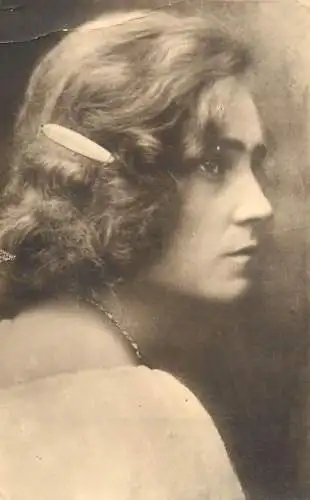 Annonymous person portrait vintage souvenir photo postcard elegant woman coiffure