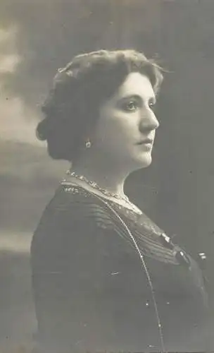 Annonymous person portrait vintage souvenir photo postcard elegant woman coiffure