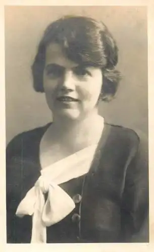 Annonymous person portrait vintage souvenir photo postcard elegant woman smile