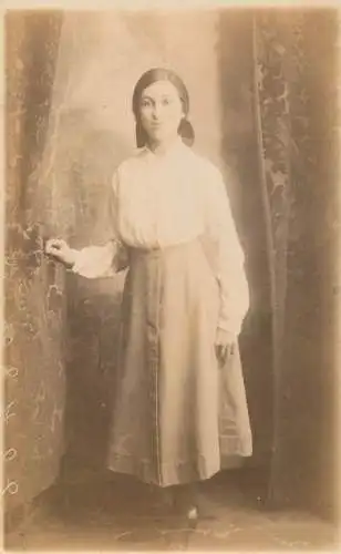 Annonymous person portrait vintage souvenir photo postcard elegant woman