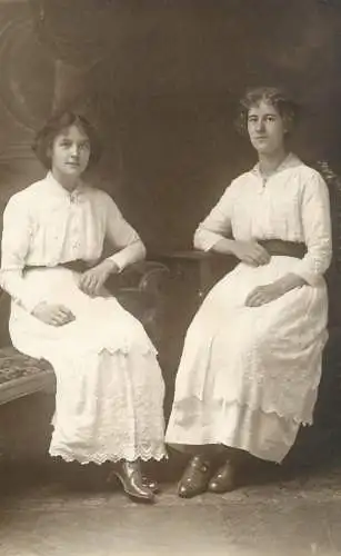 Annonymous person portrait vintage souvenir photo postcard elegant women white dress
