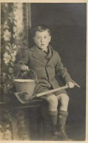 Children scenes & portraits souvenir photo elegant young boy with showel and bucket