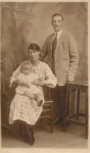 British social history souvenir photo elegant couple and baby