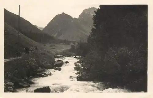 Switzerland postcard place to identify waterfall and rural landscape