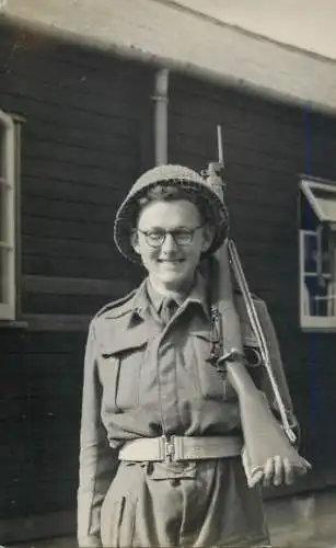 Military soldier cadet uniform and rifle souvenir photo
