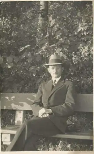 Men portrait vintage photo postcard elegant young man with hat and glasses