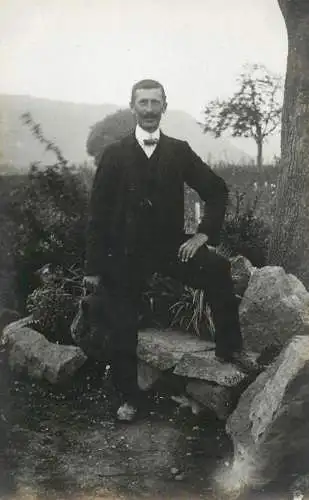 Men portrait vintage photo postcard elegant man in nature