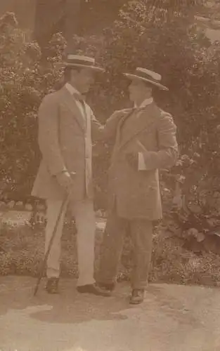 Men portrait vintage photo postcard elegant men in orchard and hats