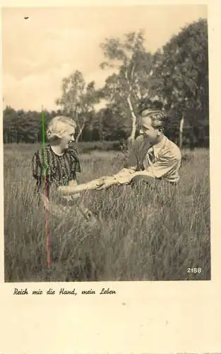 Postcard Couple lovers in nature young embrace