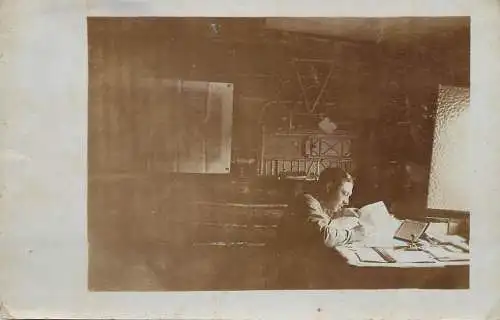Man working at desk vintage photo postcard