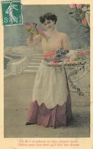 Femme avec poisson