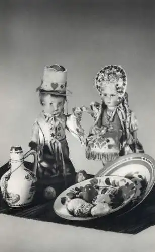 Easter greetings painted eggs & miniature dolls in traditional costumes