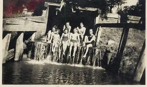 Anonymous persons bathing group souvenir photo