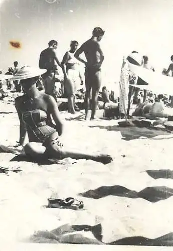 Anonymous persons seaside souvenir photo