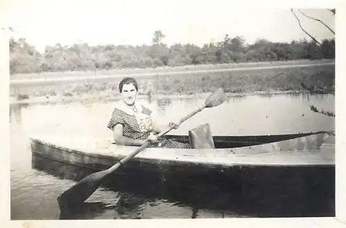 woman canoe boat