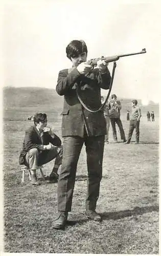 Annonimous person with rifle