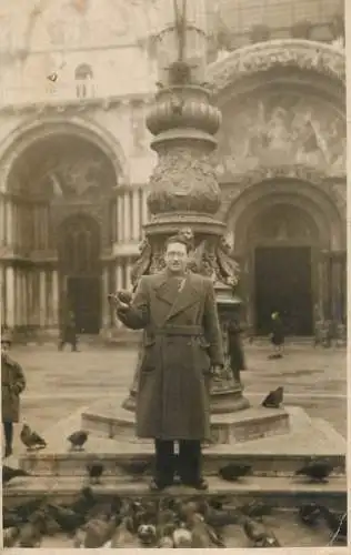 Social history photo elegant man in city square
