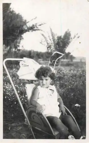 Social history photo small child in stroller
