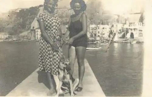 Social history photo women and dog at sea 1948