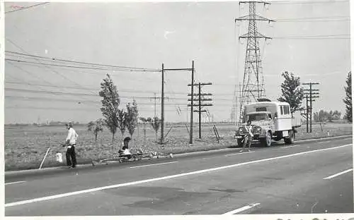 Postcard electricians working in the field