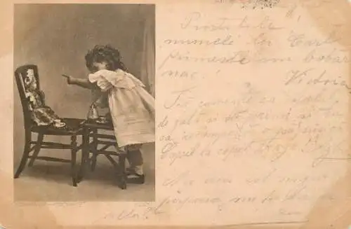 Postcard child playing with a tea set