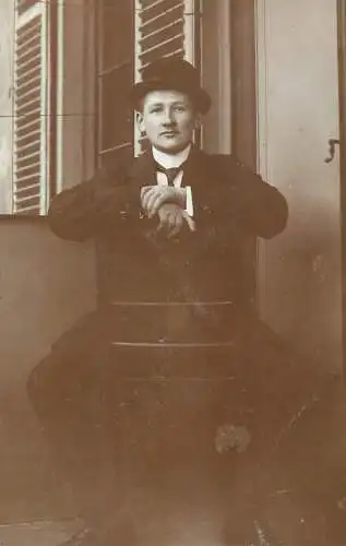 Postcard photograph of an elegant man in tux