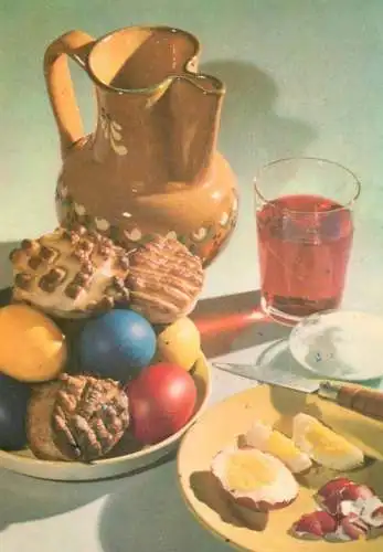 Easter greetings painted eggs and typical Holiday food table detail view