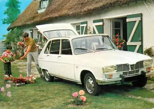 Father and son loading the car trunk with flowers