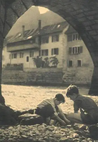 Children postcard playing on the beach