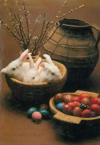 Easter Holiday greetings rabbits, painted eggs and blossom willow branch decorative ornaments