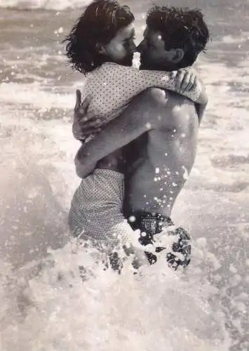 Couple scene love sea embrace in the wave