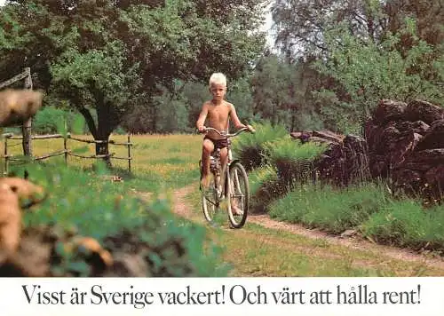 Sweden child on a bicycle in nature