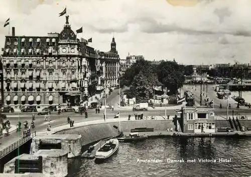Netherlands Amsterdam Damrak met Victoria Hotel