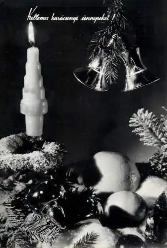 Christmas greetings decorative ornaments, lit candle detail view