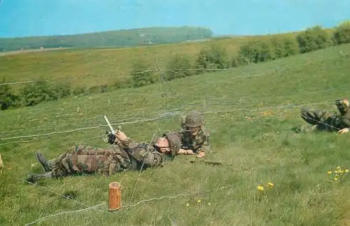 Belgian army military manoeuvres infantry soldiers barb wire crossing exercise