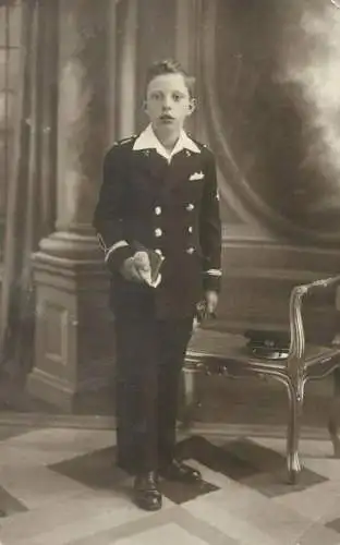 Vintage studio photo boy in uniform