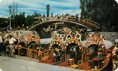 Mexico Xochimilco flower-decked boats with tourists
