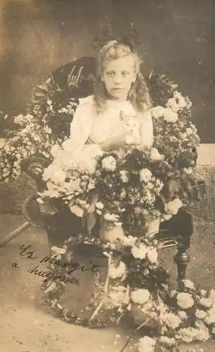 Elegant charming beautiful girl flower surrounded