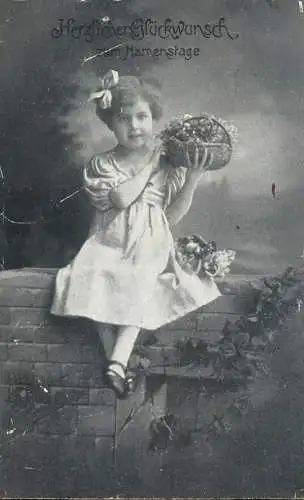 Elegant charming girl with flower basket Name Day greetings