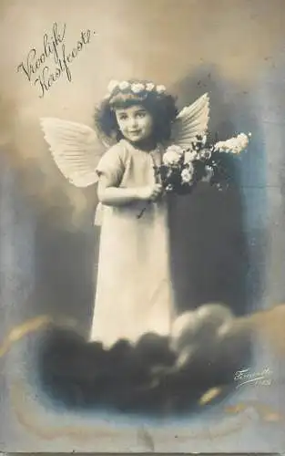 Young angel girl on a cloud Christmas greetings